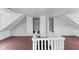 Bright and spacious upper level with multiple rooms and access to stairs at 249 N Beville Ave, Indianapolis, IN 46201