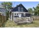 Blue house with large deck and backyard at 249 N Beville Ave, Indianapolis, IN 46201