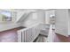 Upper level bedroom with hardwood floors and a view at 249 N Beville Ave, Indianapolis, IN 46201