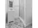 Small bathroom with shower and patterned floor at 249 N Beville Ave, Indianapolis, IN 46201