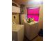 Laundry room with washer, dryer, and water heater at 2220 S Burke St, Indianapolis, IN 46231