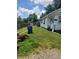 View of the house's exterior and yard at 2220 S Burke St, Indianapolis, IN 46231