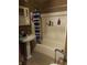 Bathroom with shower/tub combo and pedestal sink at 2220 S Burke St, Indianapolis, IN 46231