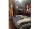 Bedroom with full-size bed and wood flooring at 2220 S Burke St, Indianapolis, IN 46231
