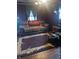Living room with sofa, area rug, and hardwood floors at 2220 S Burke St, Indianapolis, IN 46231