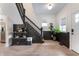 Open entryway showcasing a staircase, light flooring, and a coffee bar area at 1134 St Peter St, Indianapolis, IN 46203