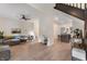 Open-concept living area with hardwood floors, and a view into the kitchen at 1134 St Peter St, Indianapolis, IN 46203