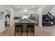 Spacious kitchen with island, stainless steel appliances, and light wood flooring at 1134 St Peter St, Indianapolis, IN 46203