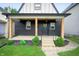 Charming house with a covered porch and landscaping at 1134 St Peter St, Indianapolis, IN 46203
