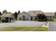Community clubhouse with stone exterior and parking at 2148 Heather Glen Way, Franklin, IN 46131