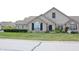 Stone front home with landscaping and green lawn at 2148 Heather Glen Way, Franklin, IN 46131
