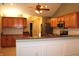 Open kitchen with island and stainless steel appliances at 2148 Heather Glen Way, Franklin, IN 46131