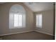 Bright bedroom with arched window and plantation shutters at 2148 Heather Glen Way, Franklin, IN 46131