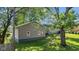 Detached garage with side yard view at 11445 N School St, Fishers, IN 46038