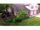 Private patio with wooden fence and landscaping, adjacent to home at 7433 Prairie Lake Dr, Indianapolis, IN 46256