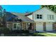 Two-story home with brick and siding exterior at 7433 Prairie Lake Dr, Indianapolis, IN 46256