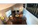 Vaulted ceilings, stone fireplace, hardwood floors, and loft view at 7433 Prairie Lake Dr, Indianapolis, IN 46256