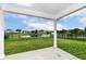 Covered patio overlooking a pond at 531 Genisis Dr, Whiteland, IN 46184