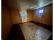 A bedroom needing significant repair and renovation at 2327 Hoyt Ave, Indianapolis, IN 46203