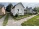 Small white house needing renovation, in need of repairs at 2327 Hoyt Ave, Indianapolis, IN 46203