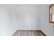 Simple bedroom with hardwood floors and a window at 9996 N County Road 200 W, Muncie, IN 47302