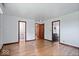 Bright bedroom with hardwood floors and access to bathroom at 9996 N County Road 200 W, Muncie, IN 47302