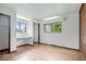 Bright bedroom with hardwood floors, built-ins and window at 9996 N County Road 200 W, Muncie, IN 47302