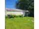 Single-car detached garage with green door at 3526 N Capitol Ave, Indianapolis, IN 46208
