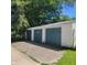 Three-car garage with green doors at 3526 N Capitol Ave, Indianapolis, IN 46208