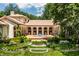 Stunning estate home with a large courtyard and manicured landscaping at 841 Alverna Dr, Indianapolis, IN 46260