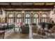 Spacious living area features large windows, hardwood floors, and comfortable furniture at 841 Alverna Dr, Indianapolis, IN 46260