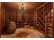 Impressive wine cellar with extensive racking and a barrel at 841 Alverna Dr, Indianapolis, IN 46260