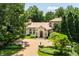 Elegant home with a grand entrance and lush landscaping at 841 Alverna Dr, Indianapolis, IN 46260