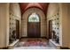 Impressive entryway with high ceilings, ornate details, and unique decor at 841 Alverna Dr, Indianapolis, IN 46260