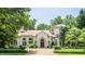 Impeccably designed home with a welcoming entrance and manicured landscaping at 841 Alverna Dr, Indianapolis, IN 46260