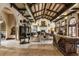 Spacious living room with high ceilings, ornate details, and a grand fireplace at 841 Alverna Dr, Indianapolis, IN 46260