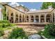 Inviting courtyard with a central fountain and meticulously landscaped surroundings at 841 Alverna Dr, Indianapolis, IN 46260