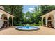 Tranquil courtyard with a central fountain, creating a serene outdoor space at 841 Alverna Dr, Indianapolis, IN 46260