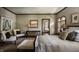 Spacious bedroom with sitting area and access to a bathroom at 841 Alverna Dr, Indianapolis, IN 46260