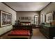 Guest bedroom with a sleigh bed and a large framed painting at 841 Alverna Dr, Indianapolis, IN 46260
