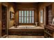 Spa-like bathroom with a large soaking tub and separate shower at 841 Alverna Dr, Indianapolis, IN 46260