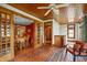 Sunroom with brick floors, French doors opening to dining room at 3917 N 525 W, Fairland, IN 46126