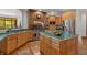 Spacious kitchen with island, stainless steel appliances, and wood cabinets at 3917 N 525 W, Fairland, IN 46126