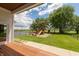 View of backyard playground and basketball court from deck at 3917 N 525 W, Fairland, IN 46126