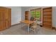 Bright home office features built-in shelves and hardwood floors at 3917 N 525 W, Fairland, IN 46126