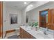 Bathroom with double vanity, and a large mirror at 3917 N 525 W, Fairland, IN 46126