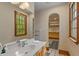 Bathroom with single sink vanity, walk-in closet, and large mirror at 3917 N 525 W, Fairland, IN 46126