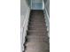Carpeted staircase with white railing at 41 S Sherman Dr, Indianapolis, IN 46201