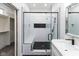Bathroom with a walk-in shower, built-in bench, and modern fixtures at 706 S Main St, Whitestown, IN 46075