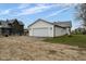 Detached garage with white siding and metal roof at 706 S Main St, Whitestown, IN 46075